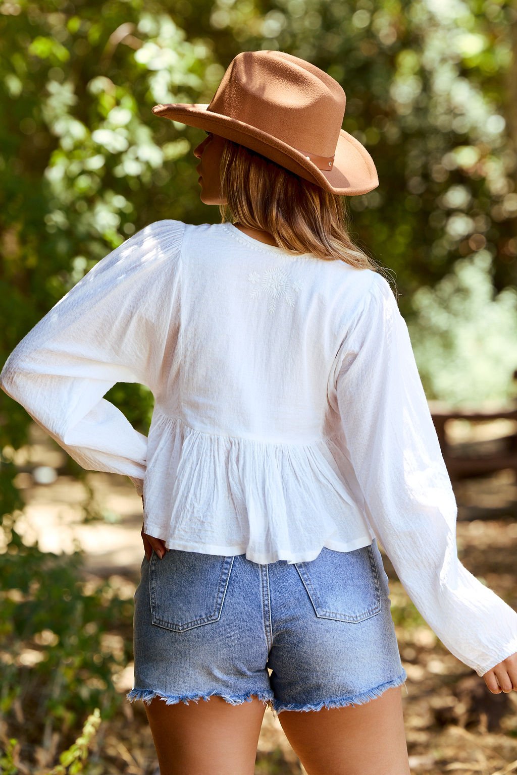 Candace White Embroidered Peplum Top